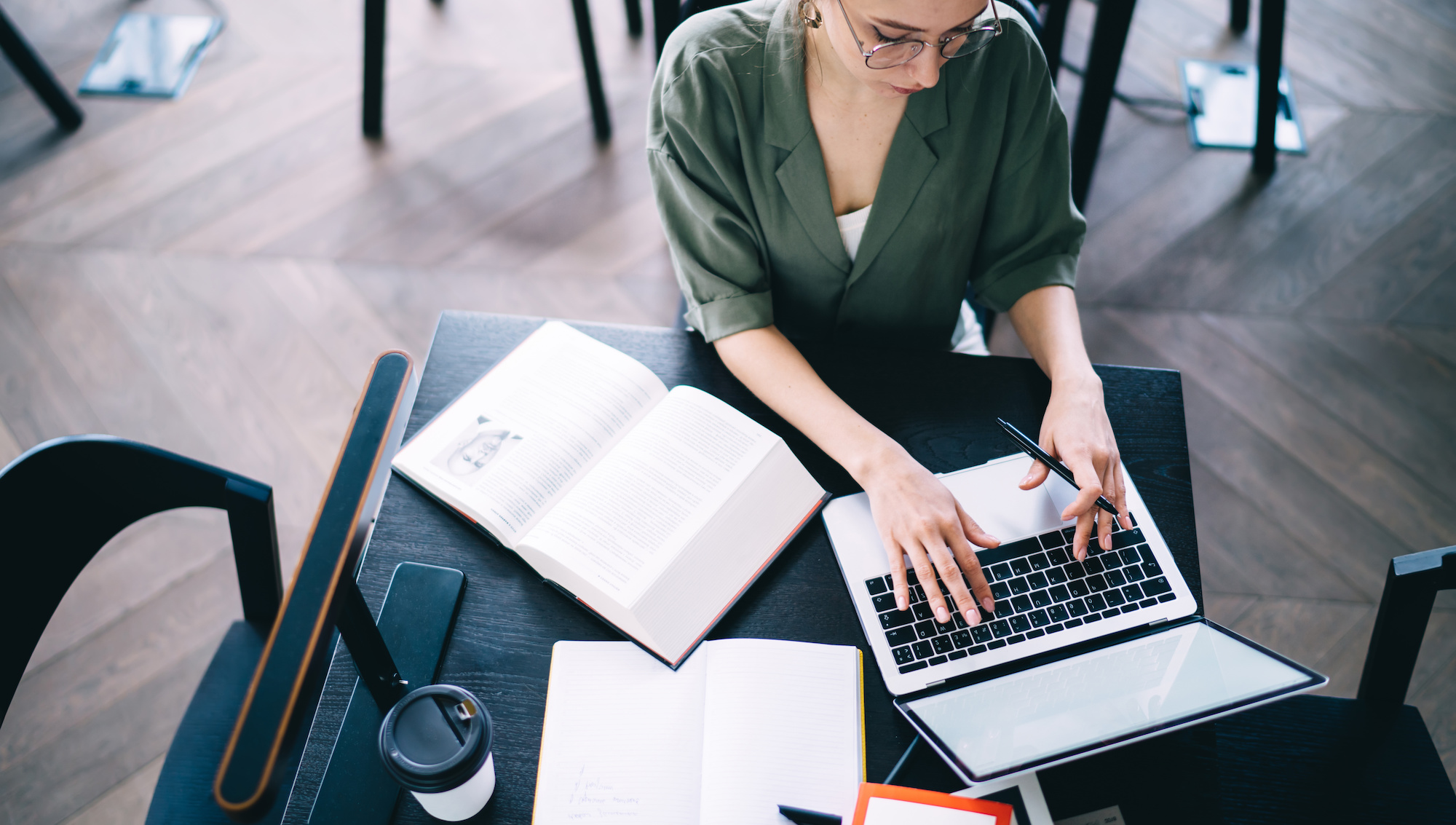 woman typing on laptop