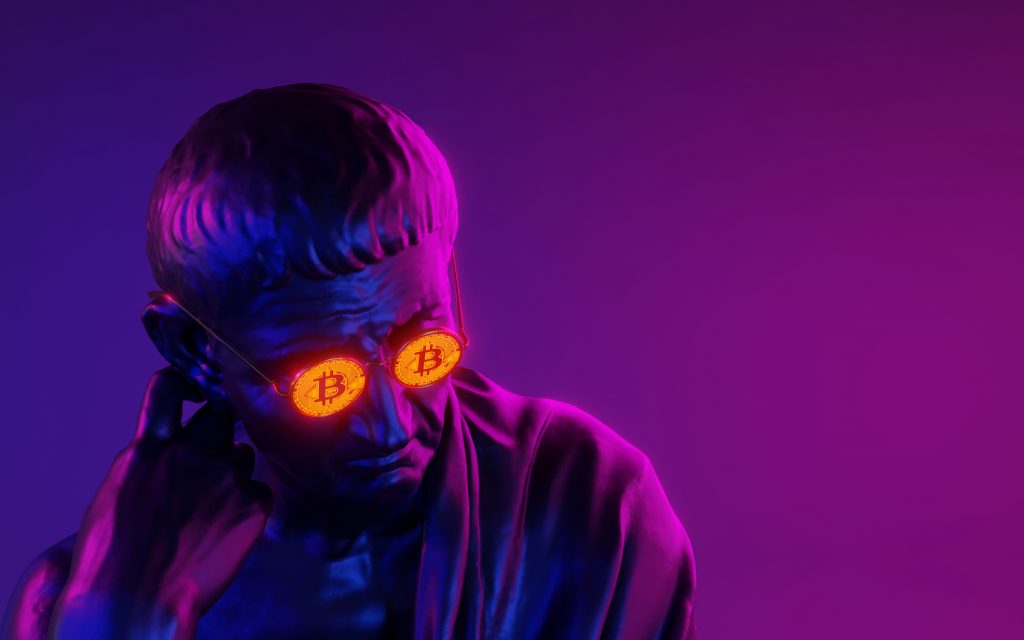 Portrait of a seated philosopher in bitcoin glasses on a neon background