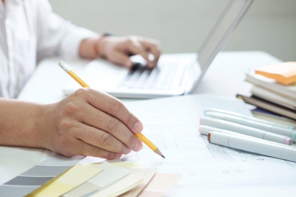 man holding pencil